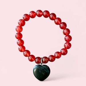 Red Beaded Bracelet with Black Heart Pendant